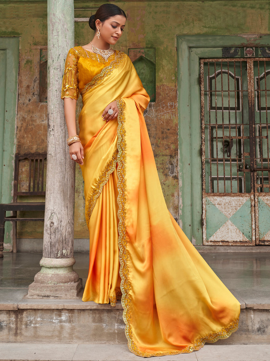 Orange satin saree crafted for elegance and style.