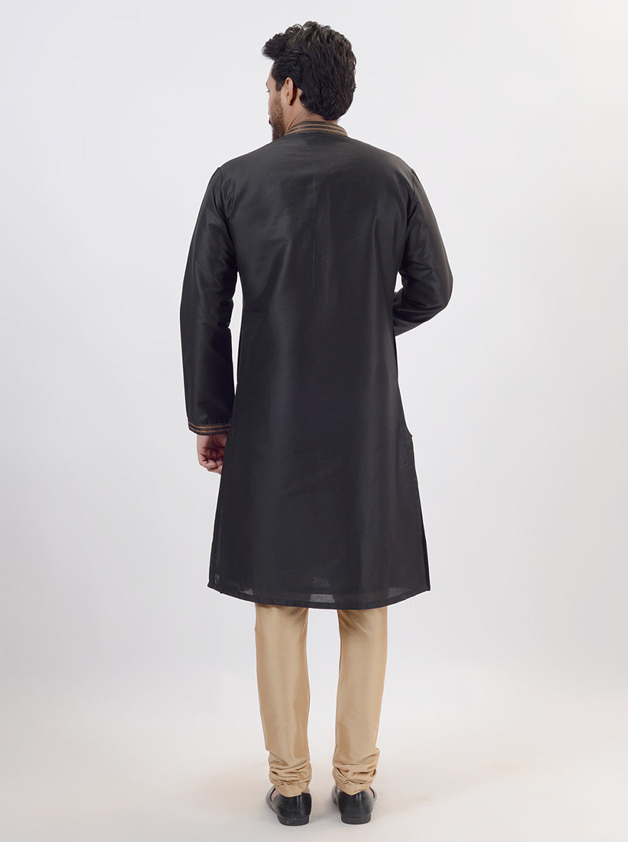 Elegant black kurta pajama set for men, perfect for traditional events, weddings, and cultural celebrations.