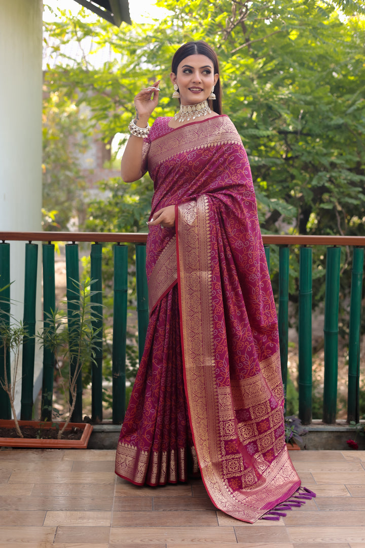 Traditional red Patola Silk Saree with stunning Zari work and Kanchi borders, ideal for festive occasions.