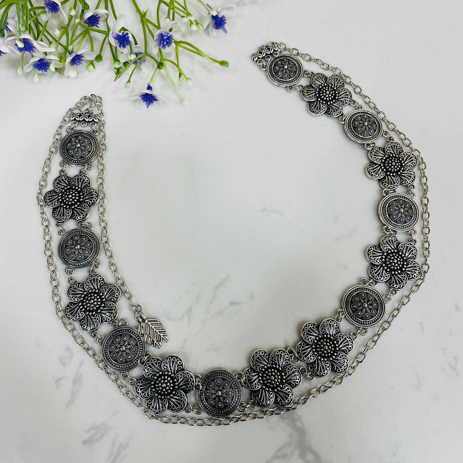 Intricate oxidised waist chain, adding elegance to ethnic outfits for weddings.