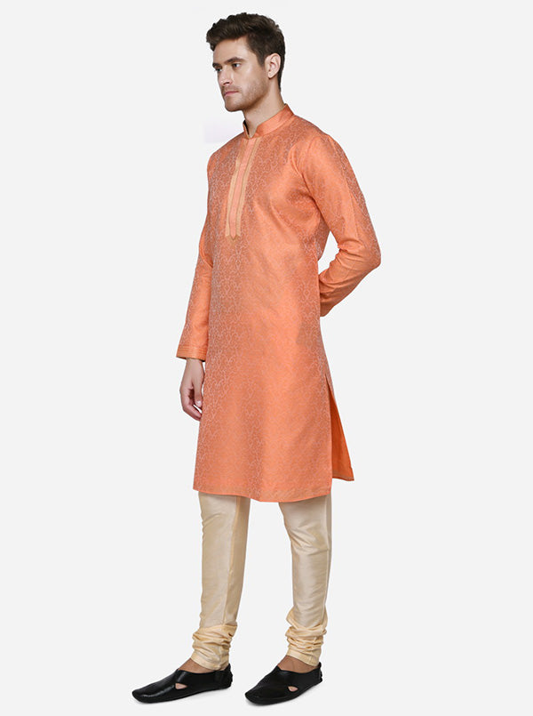 Self-design coral orange kurta set for men, featuring basic comfort and elegant design.