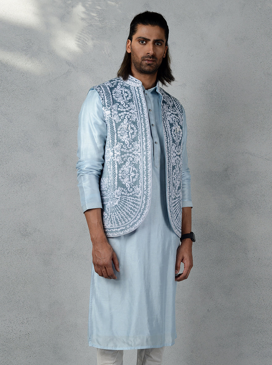 Elevate your ethnic look with this blue velvet Bandhgala jacket, perfect for making a statement at any gathering.