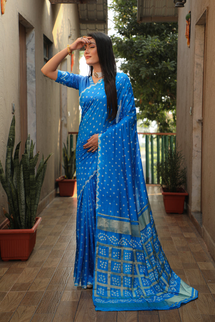 Timeless blue Bandhej silk saree with stylish checks and original Bandhej craftsmanship.