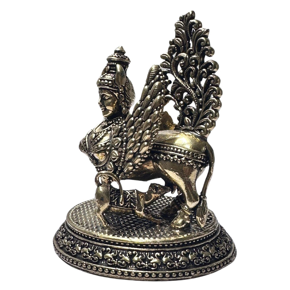 Divine Kamdhenu cow display piece, ideal for spiritual home decoration.