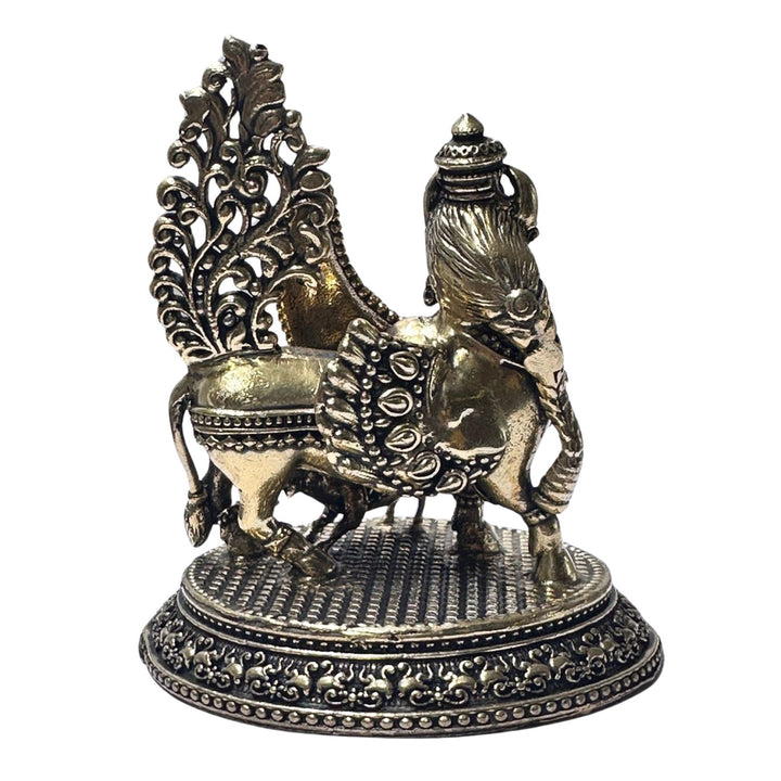 Brass Kamdhenu cow figurine, a unique accent for enriching your living space.