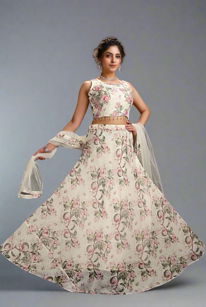 White floral crop top and skirt lehenga set made from lightweight organza fabric, perfect for festive occasions.