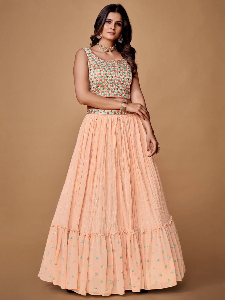 Stylish peach georgette lehenga with sequins and lace work dupatta.