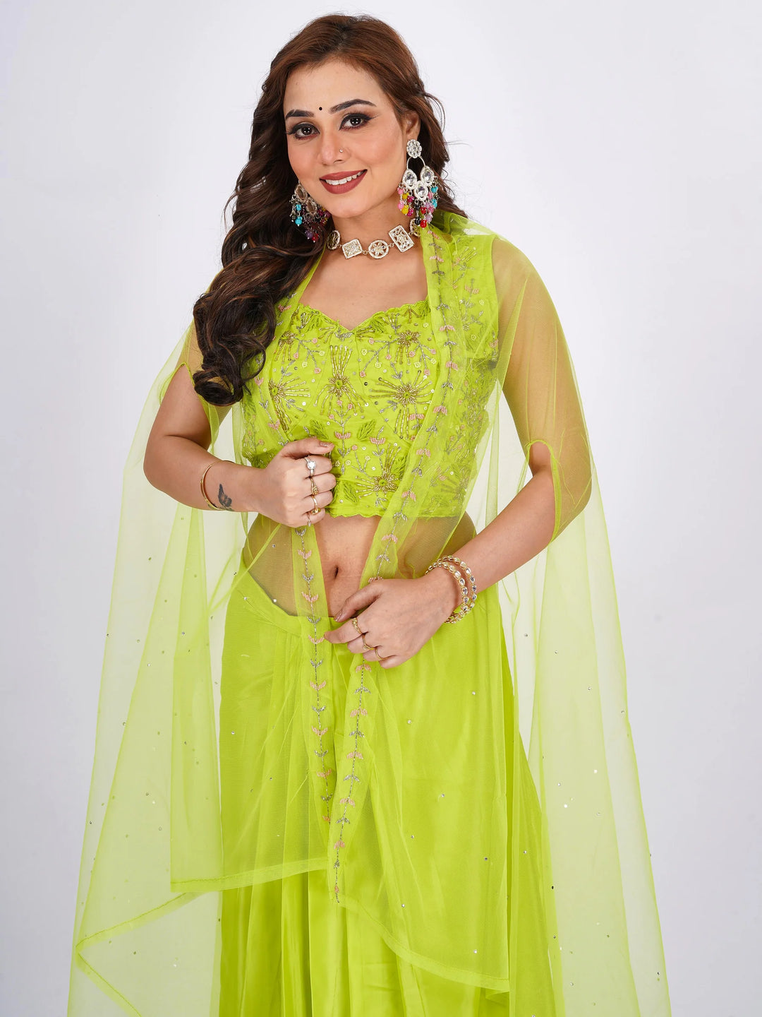 Stylish green floral crop top lehenga set in lightweight Chinon fabric, designed for a vibrant and elegant outfit.