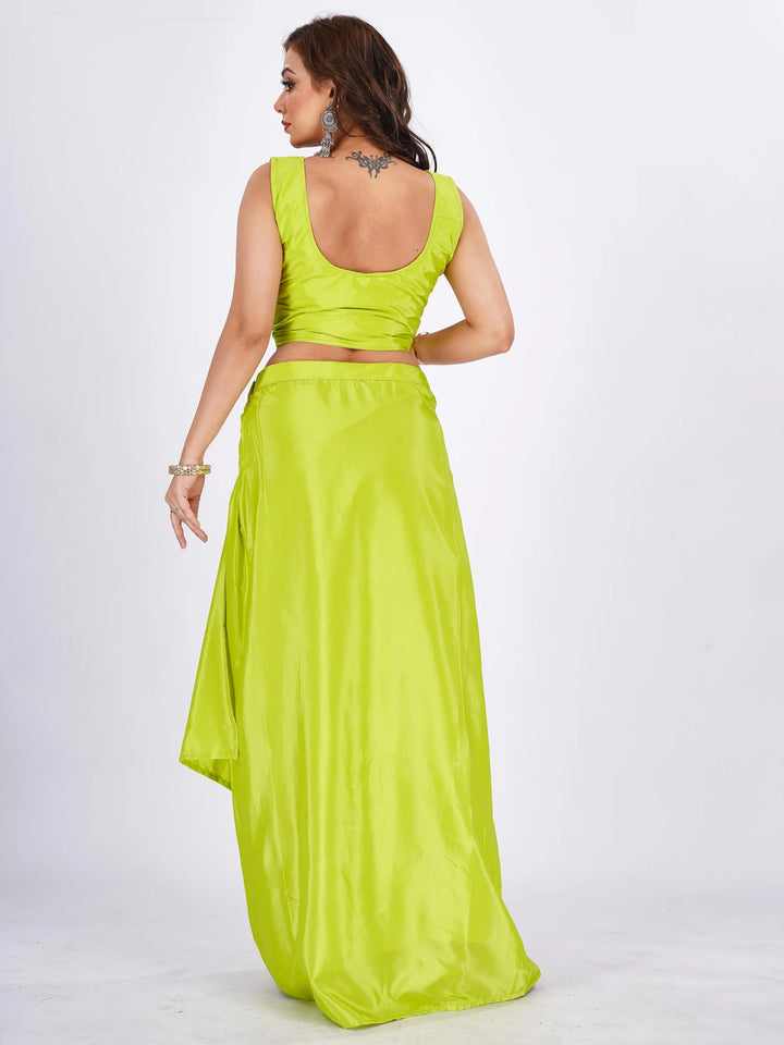 Trendy green floral crop top and skirt lehenga made from Chinon fabric, ideal for a fresh and fashionable summer look.