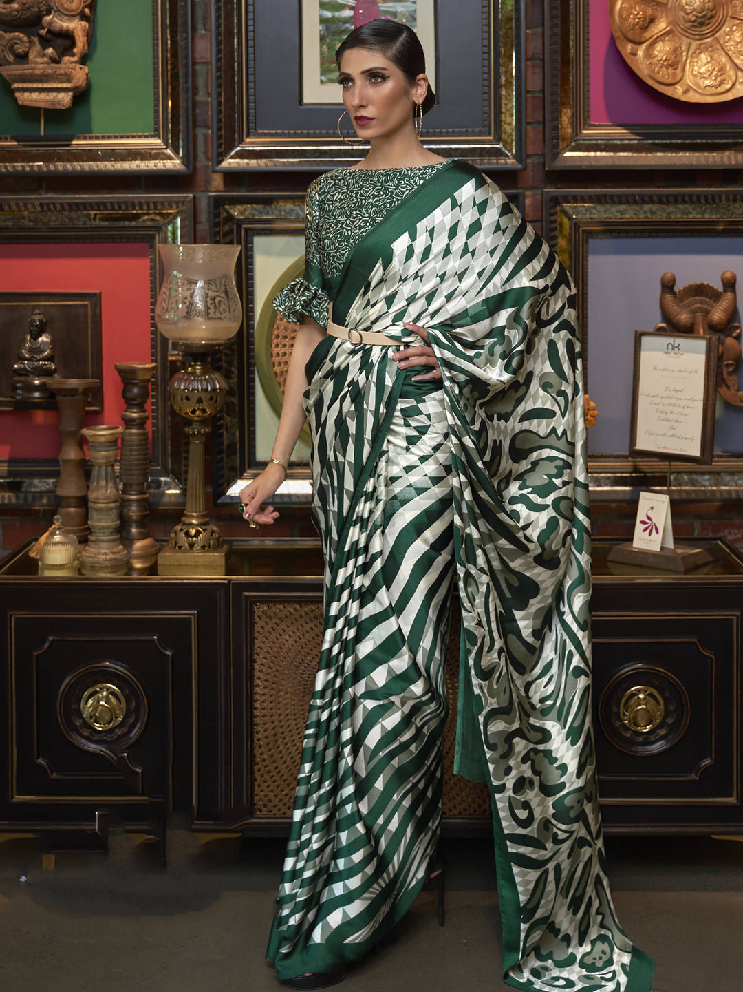 Green satin saree crafted for elegance and style.