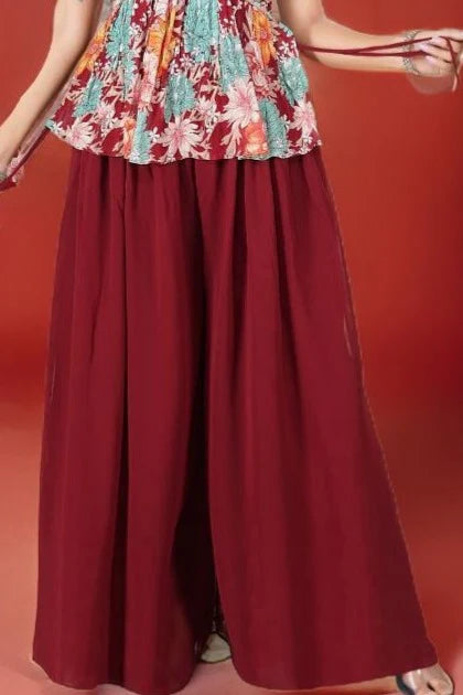 Close-up of the palazzo pants’ hemline, showcasing vibrant color transitions and designs.