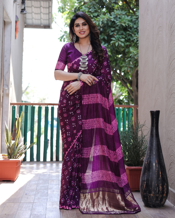 Gorgeous purple Bandhej silk saree with stunning Zari weaving and elegant Sibory motifs, ideal for weddings and celebrations.