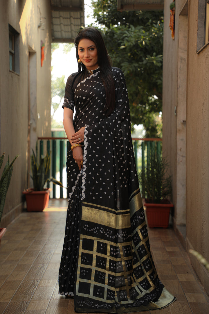 Black Bandhej silk saree with intricate checks pattern and original craft.