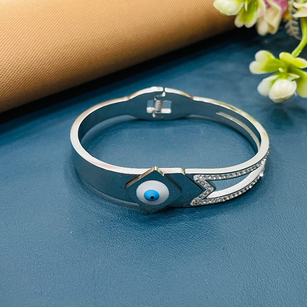 Timeless silver bracelet featuring a sleek design, perfect for layering.