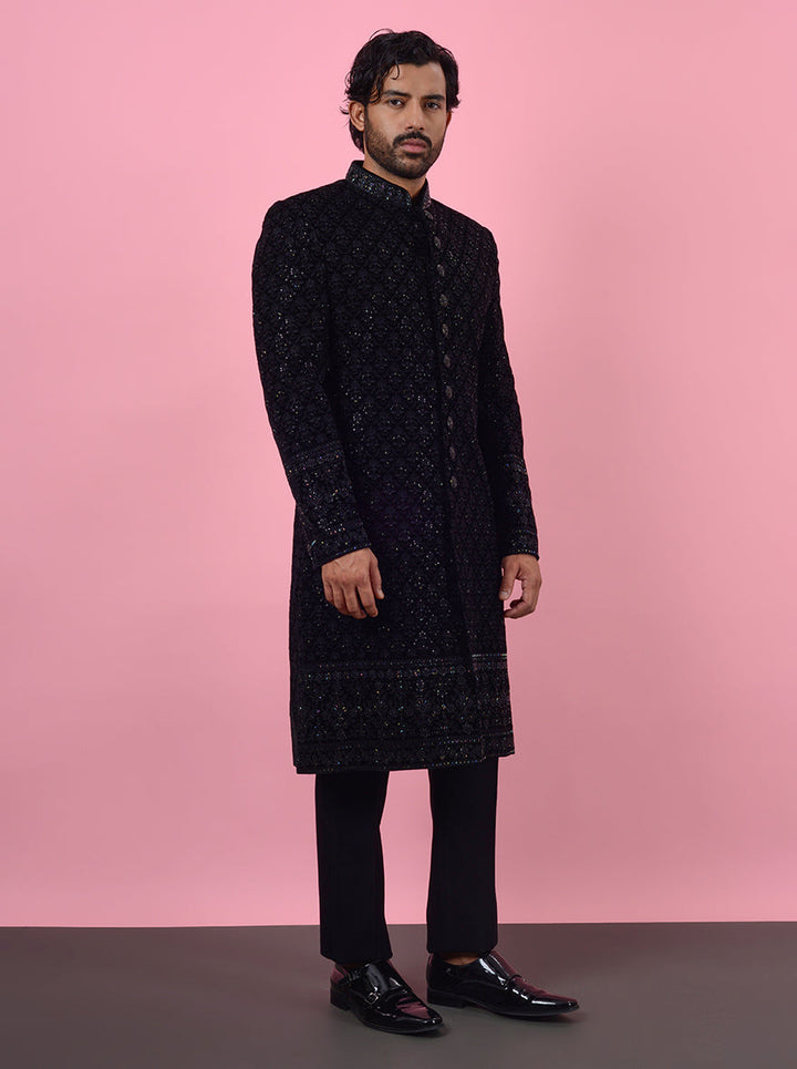 Classic black velvet outfit, men’s traditional wear