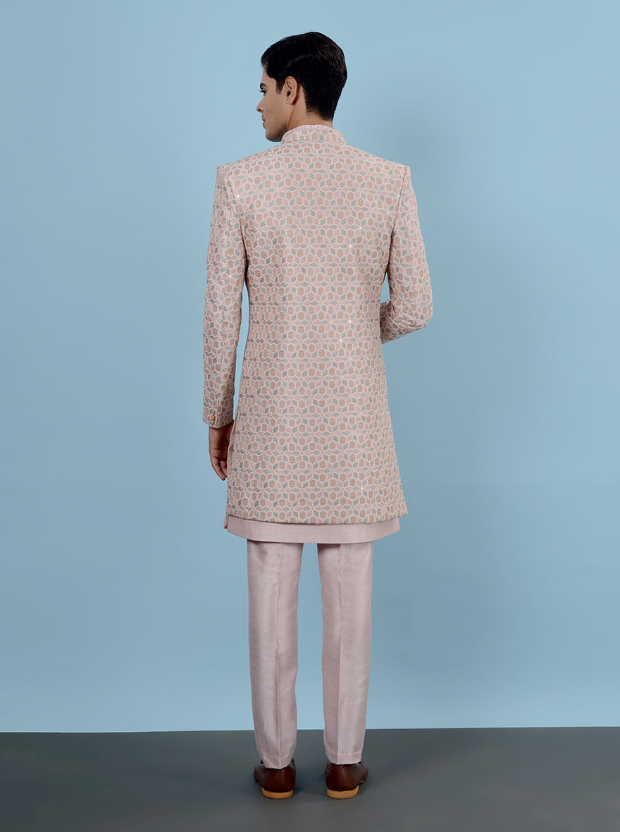 Elevate your ethnic wear collection with this Onion Peach Indowestern, designed with luxurious Silk Blend and intricate Resham and sequins work, perfect for special occasions in the USA.