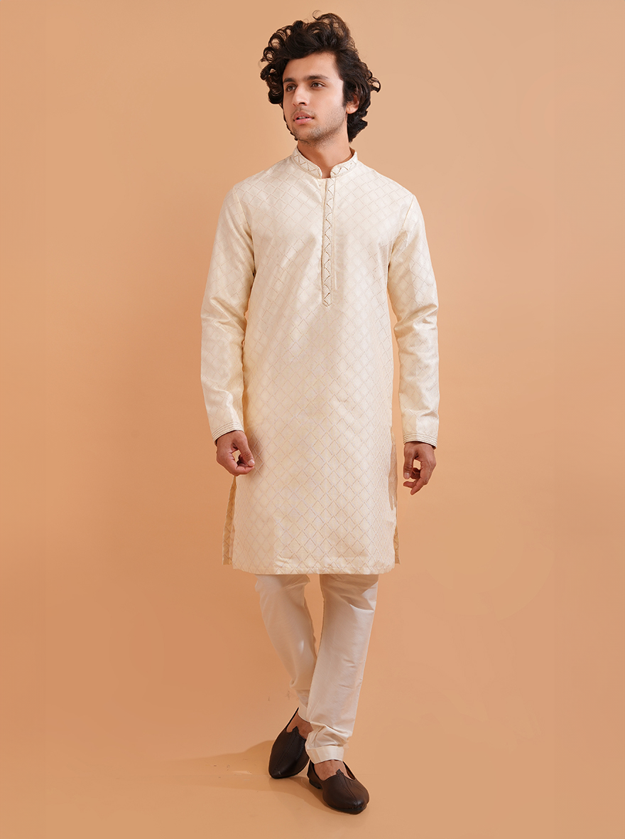 Elegant cream silk jacquard kurta pajama set for men, ideal for weddings and formal events.