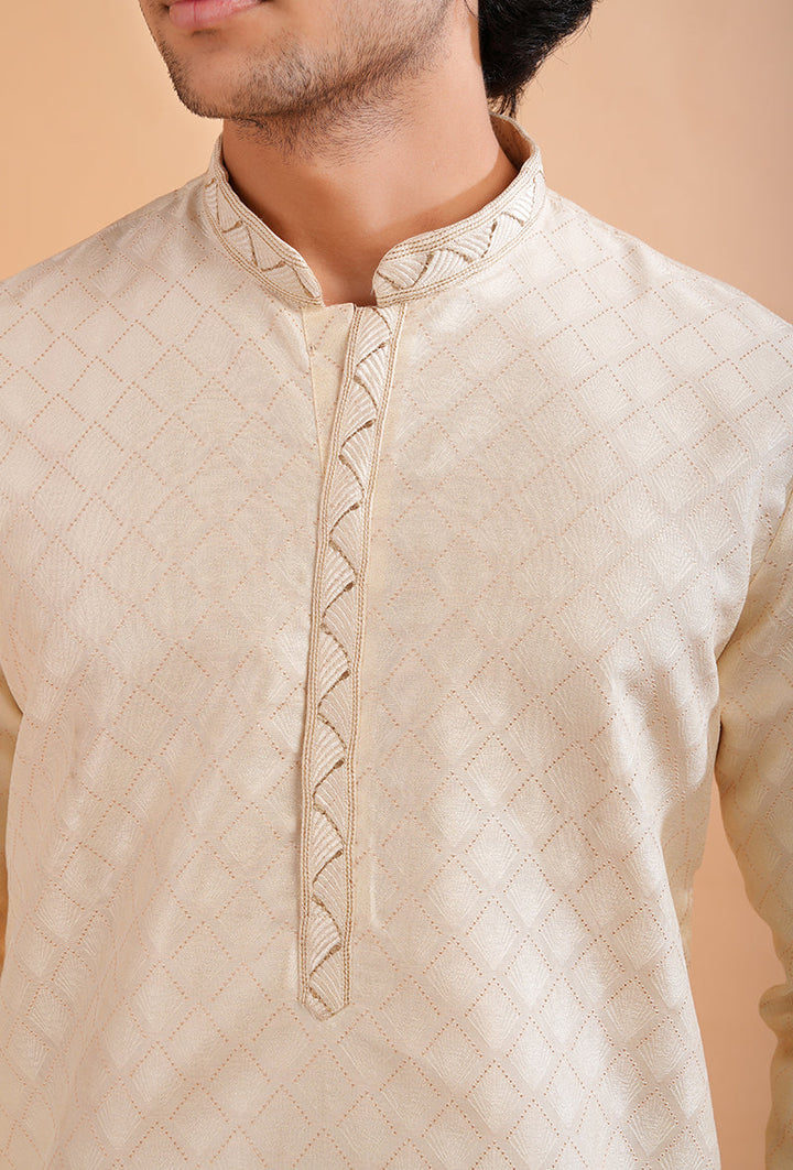 Men’s cream silk jacquard kurta pajama set, designed for traditional and formal wear.