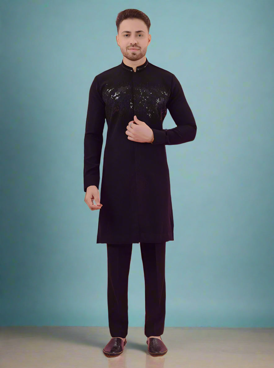 Elegant navy blue silk blend kurta pajama for men, designed with beautiful embroidered details.