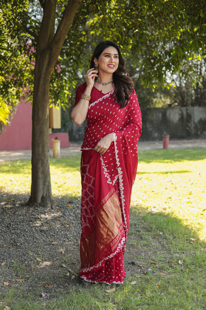 Traditional Red Bandhej Silk Saree with unique Zari weaving and Pallu, perfect for weddings.