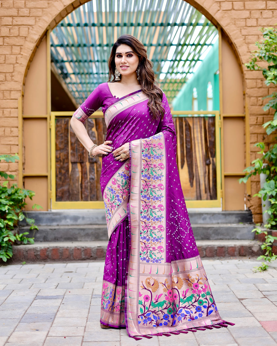 Dark purple Paithani silk saree with a zari woven border and Bandhej design, ideal for festive and wedding occasions.