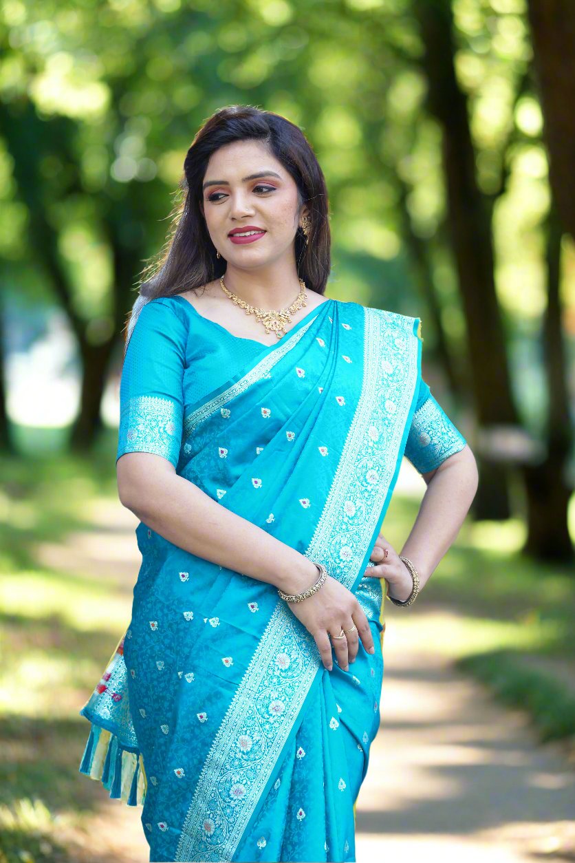 Traditional sky-blue Kanjivaram silk saree with intricate weaving, perfect for adding elegance to any event.