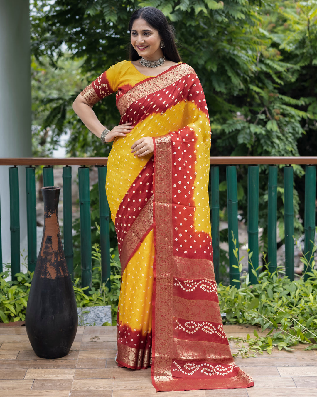 Gorgeous yellow Bandhej silk saree with exquisite zari work and a matching blouse, perfect for formal gatherings.