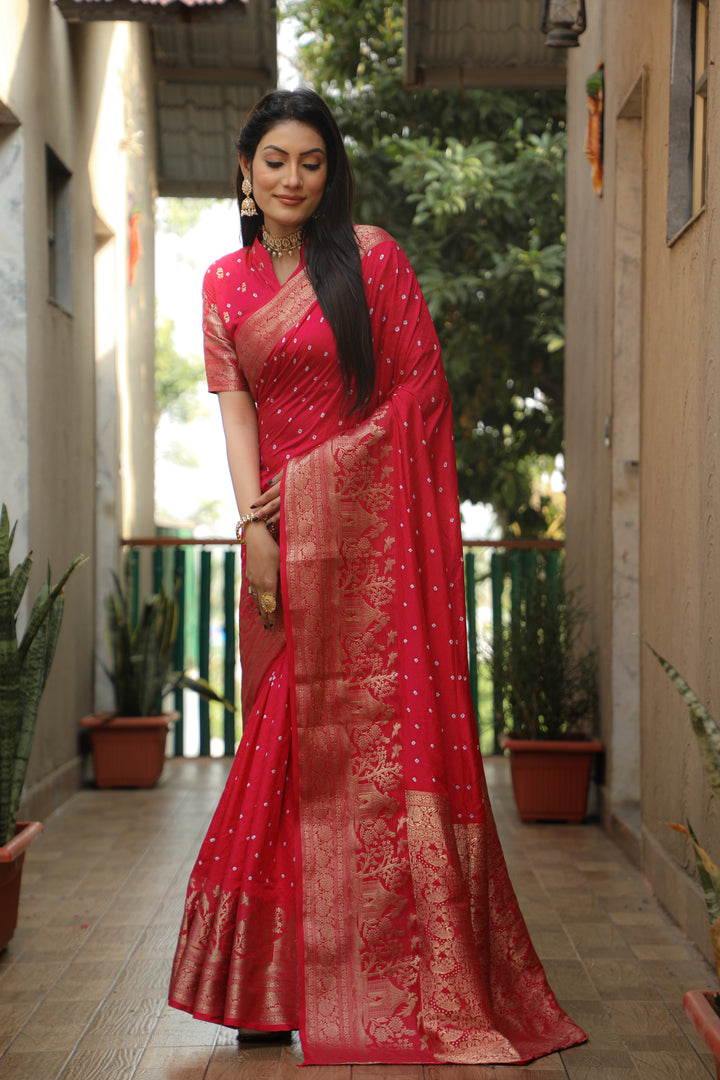 Timeless bright pink Kanjivaram silk saree with rich detailing, ideal for grand celebrations.