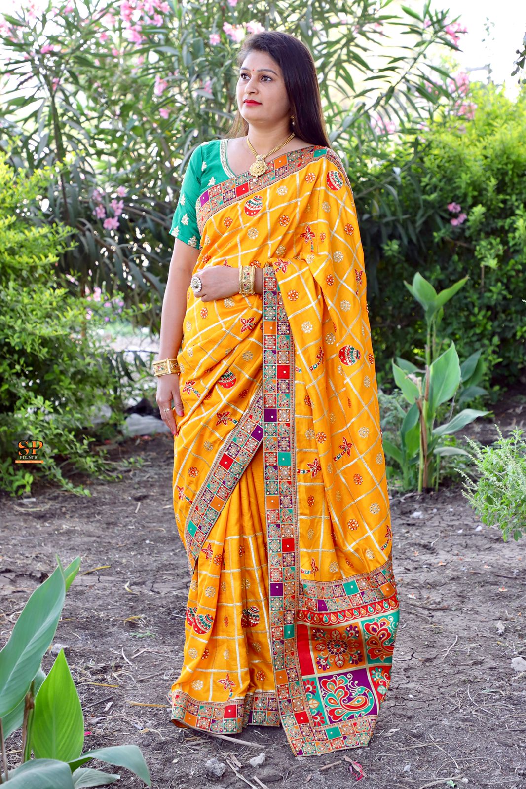 Yellow Dola Silk saree with diamond work and a luxurious jacquard lace border, designed to impress.