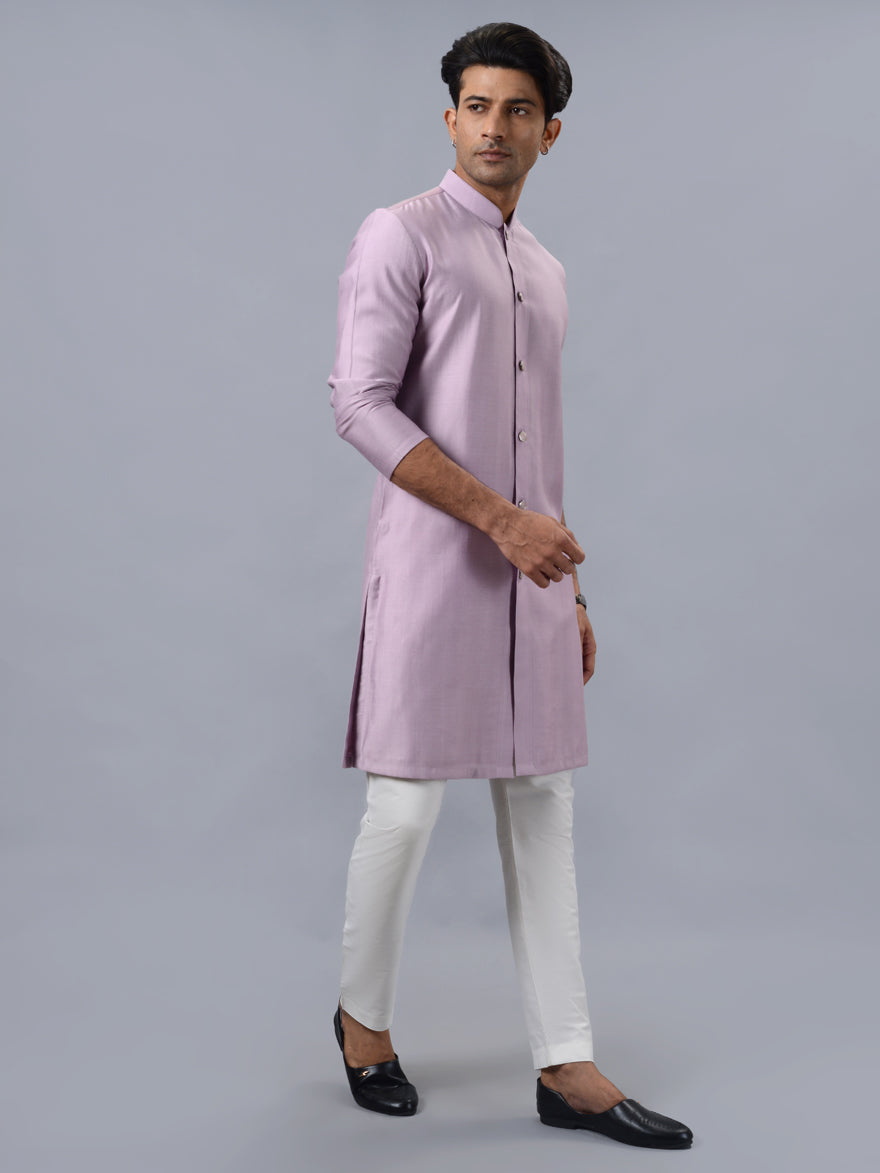 Trendy pink kurta pajama set for men, perfect for events like Diwali and other cultural celebrations.