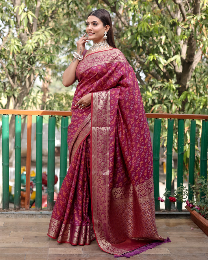 Beautiful blue Bandhej Patola silk saree with intricate zari detailing and Kanchi borders, designed for traditional events.