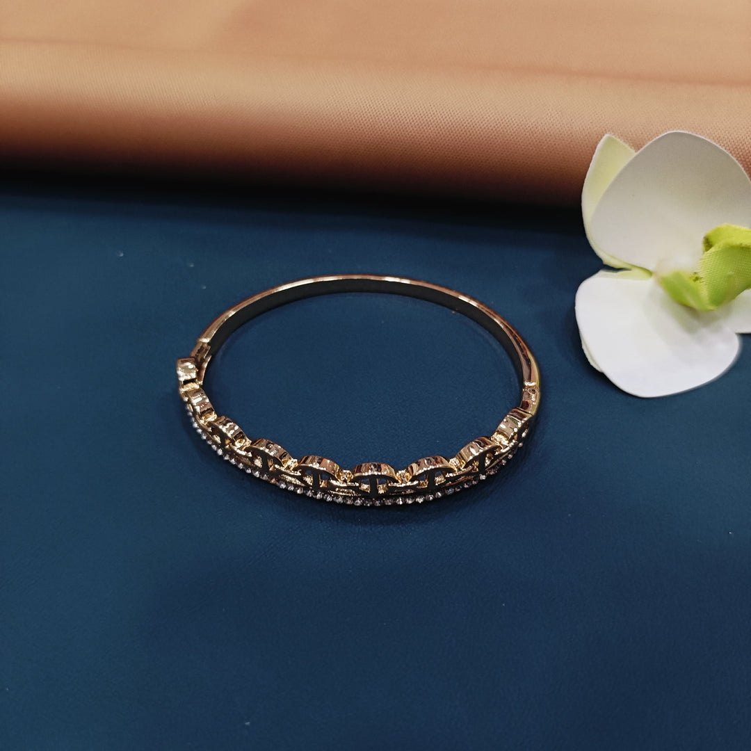 Dainty golden bracelet for a personal touch.