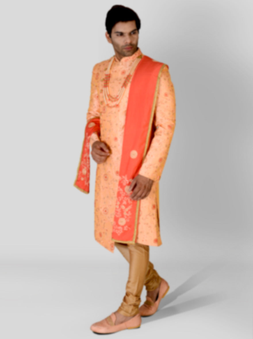 Peach Indo Western dress for men featuring floral details and silk.