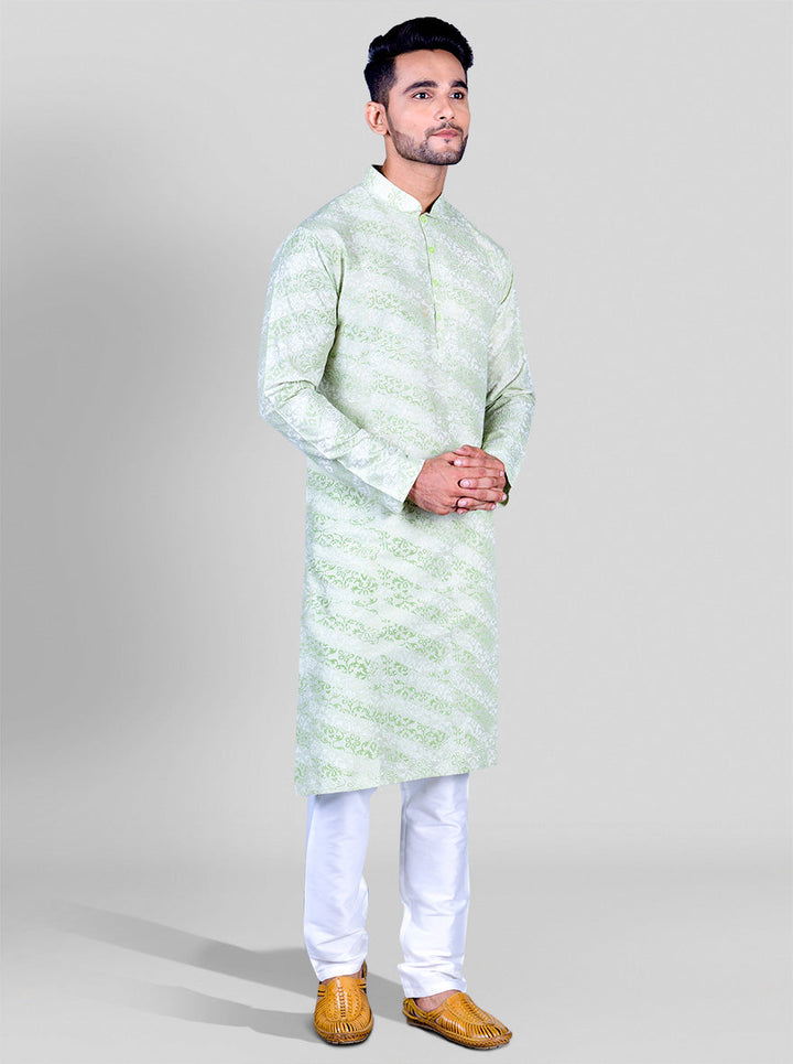 Stylish green silk kurta pajama for men, designed for comfort and sophistication.