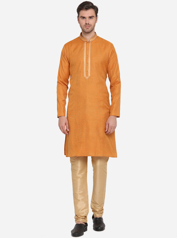 Trendy orange kurta pajama, ideal for festive gatherings or stylish outings.