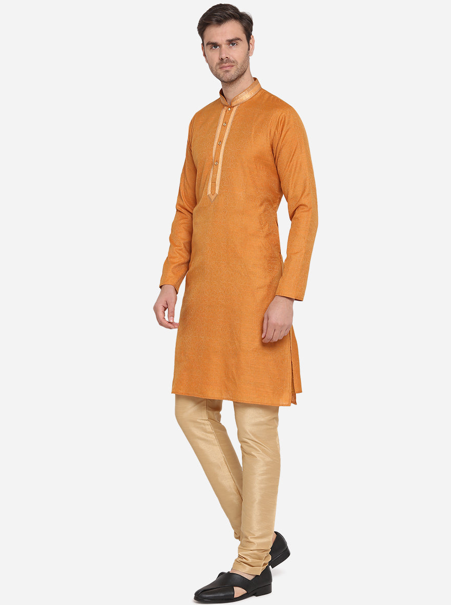 Chic orange kurta set, adding a stylish edge to your ethnic collection.