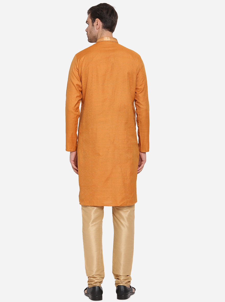 Elegant orange kurta set, enhancing your ethnic wardrobe.