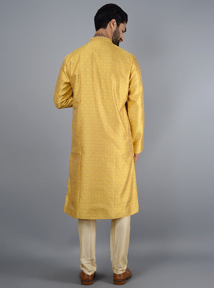 Stylish bright yellow kurta set designed for modern men celebrating in the USA.