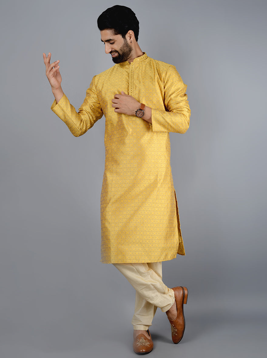 Bright yellow kurta pajama crafted from silk jacquard, ideal for special events.