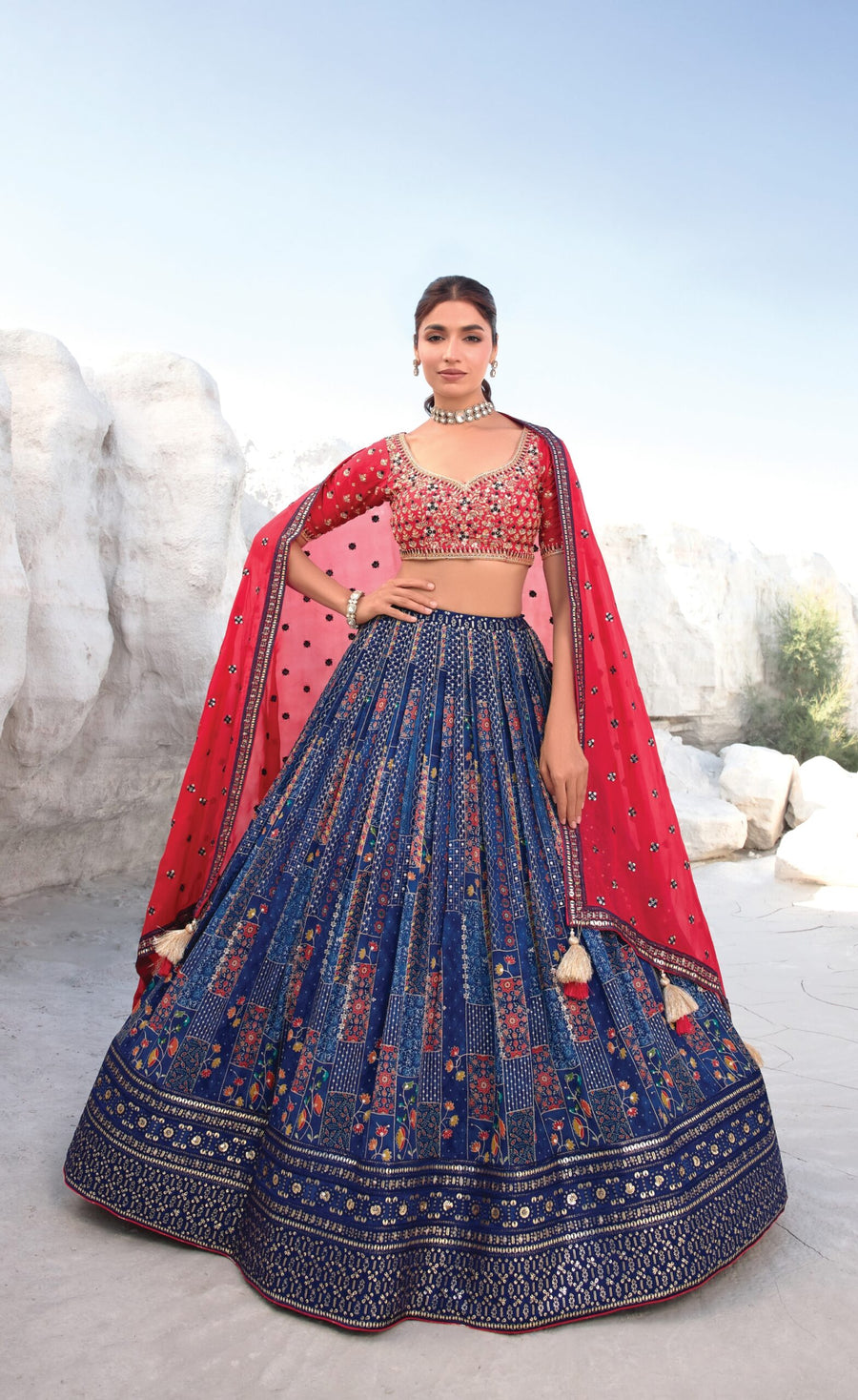 Navy blue and red lehenga choli for brides, featuring intricate designs perfect for weddings and grand occasions.