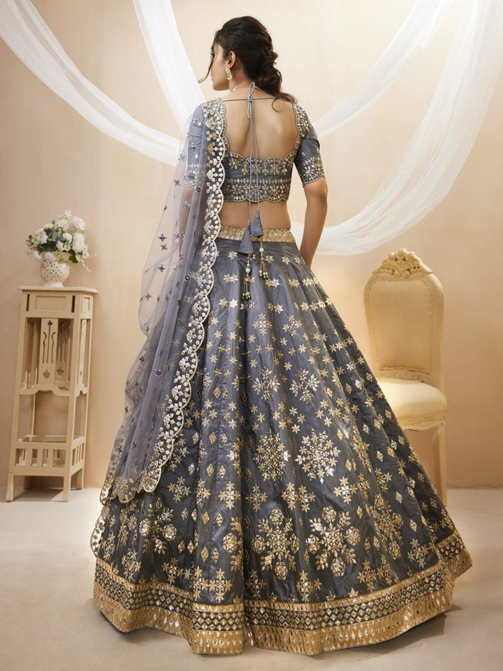 Stylish grey Art Silk Lehenga with beautiful embroidery and a delicate dupatta, designed for cultural celebrations and weddings.