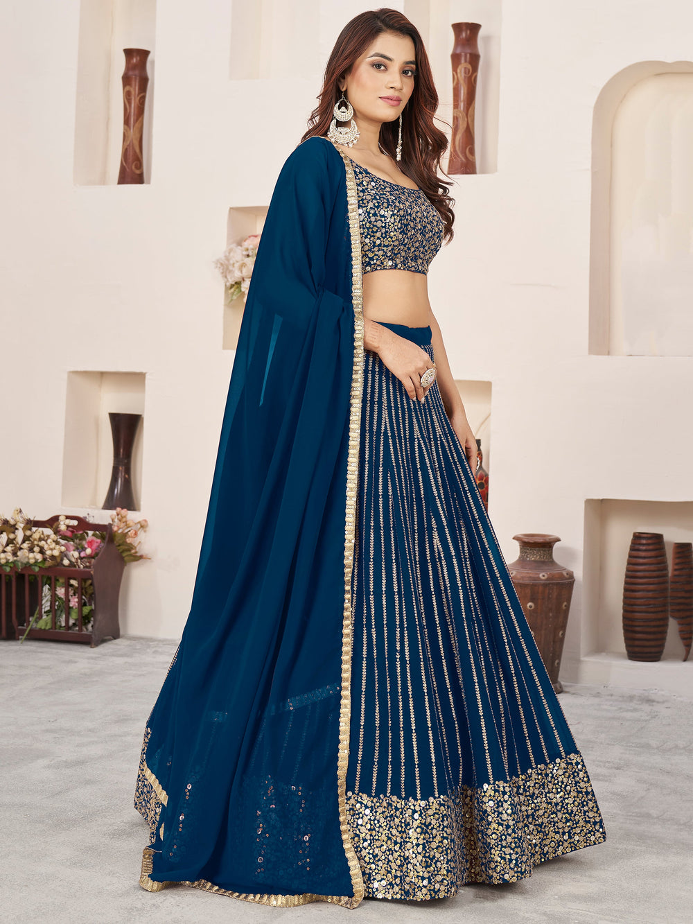 AwesomeÃ‚Â Blue Sequins Georgette Reception Wear Lehenga Choli