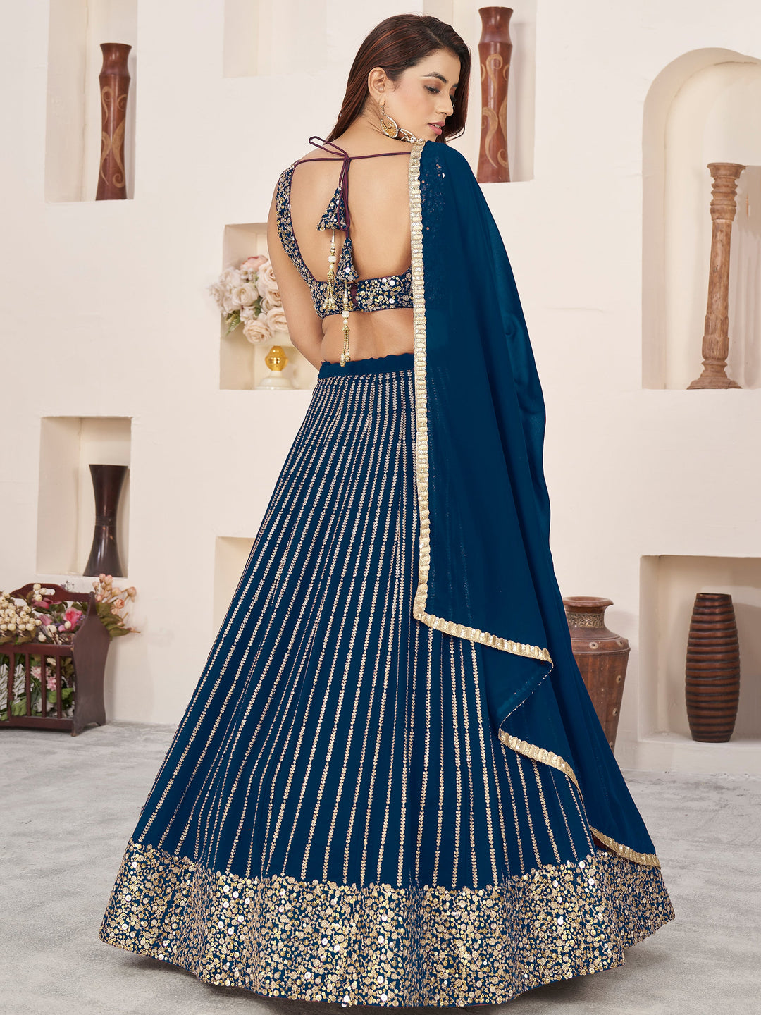 AwesomeÃ‚Â Blue Sequins Georgette Reception Wear Lehenga Choli