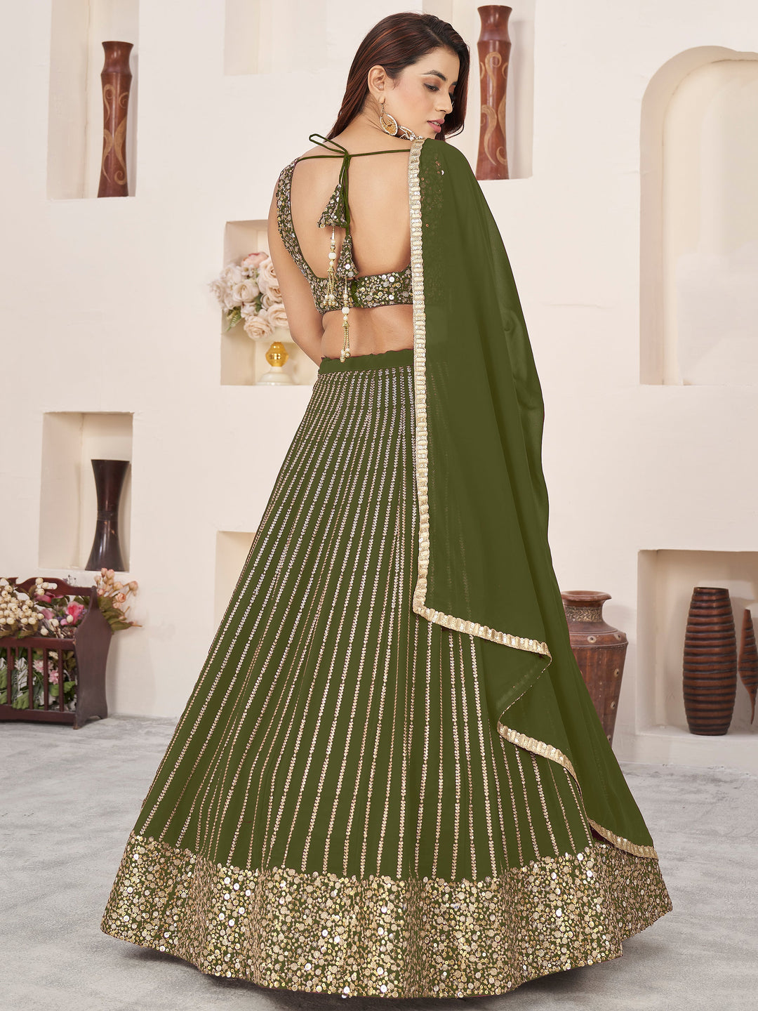 OutstandingÃ‚Â Green Sequins Georgette Mehendi Wear Lehenga Choli