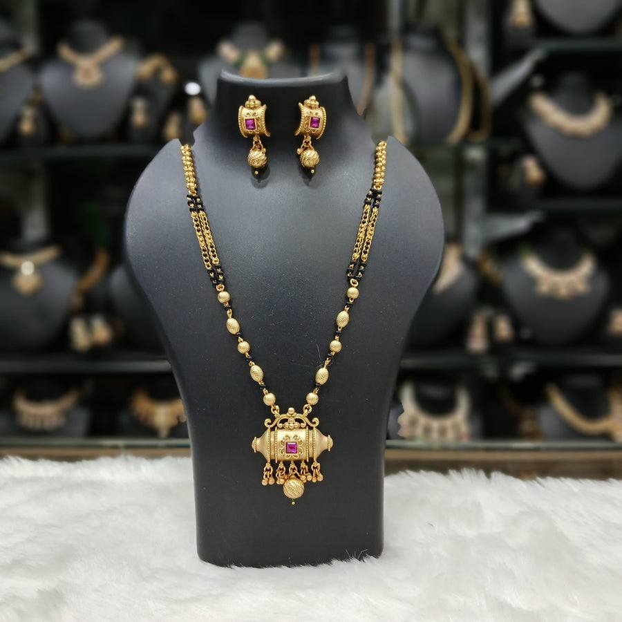 Black and gold mangalsutra, crafted in gold-plated alloy, stylish traditional necklace.