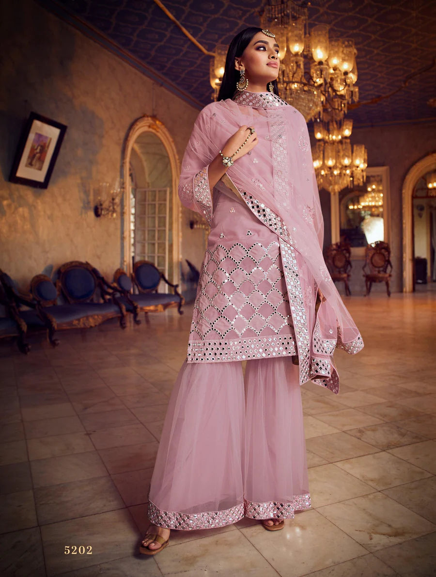 Baby pink A-line sharara suit with intricate embroidery for wedding events