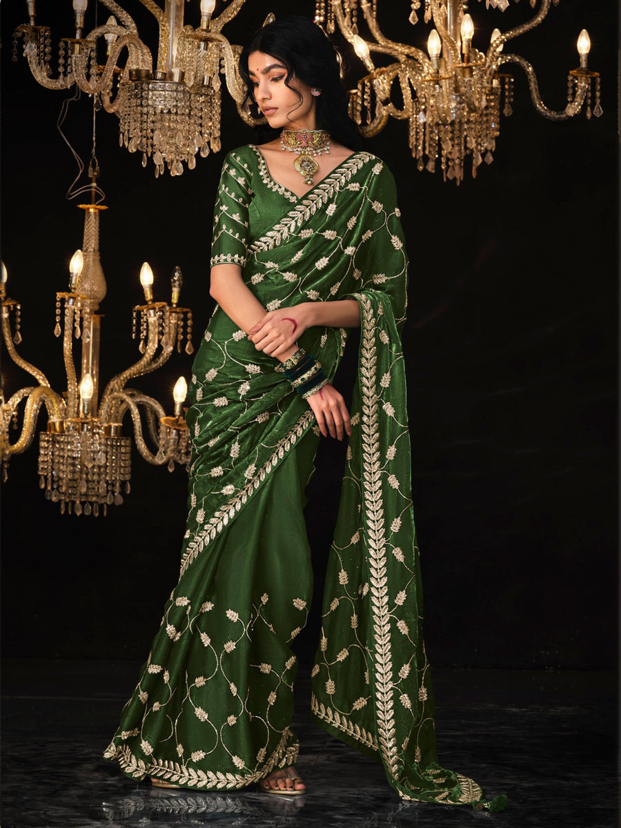 Green silk saree crafted for elegance and style.