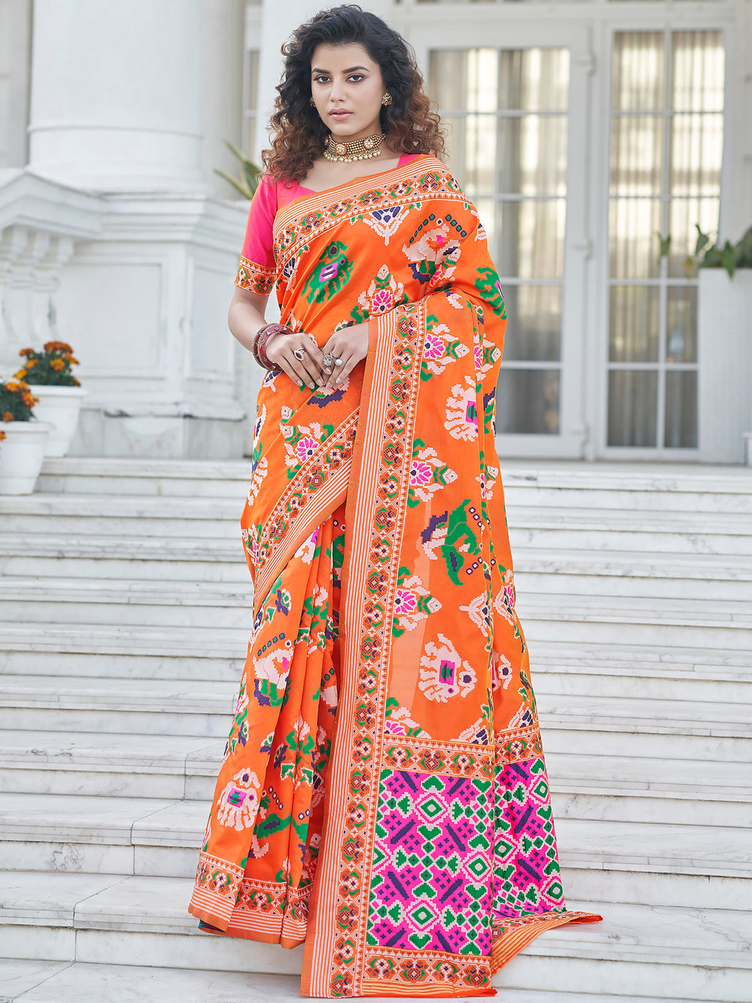 Orange silk saree crafted for elegance and style.