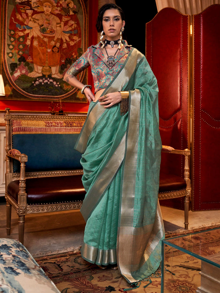 Green silk saree crafted for elegance and style.