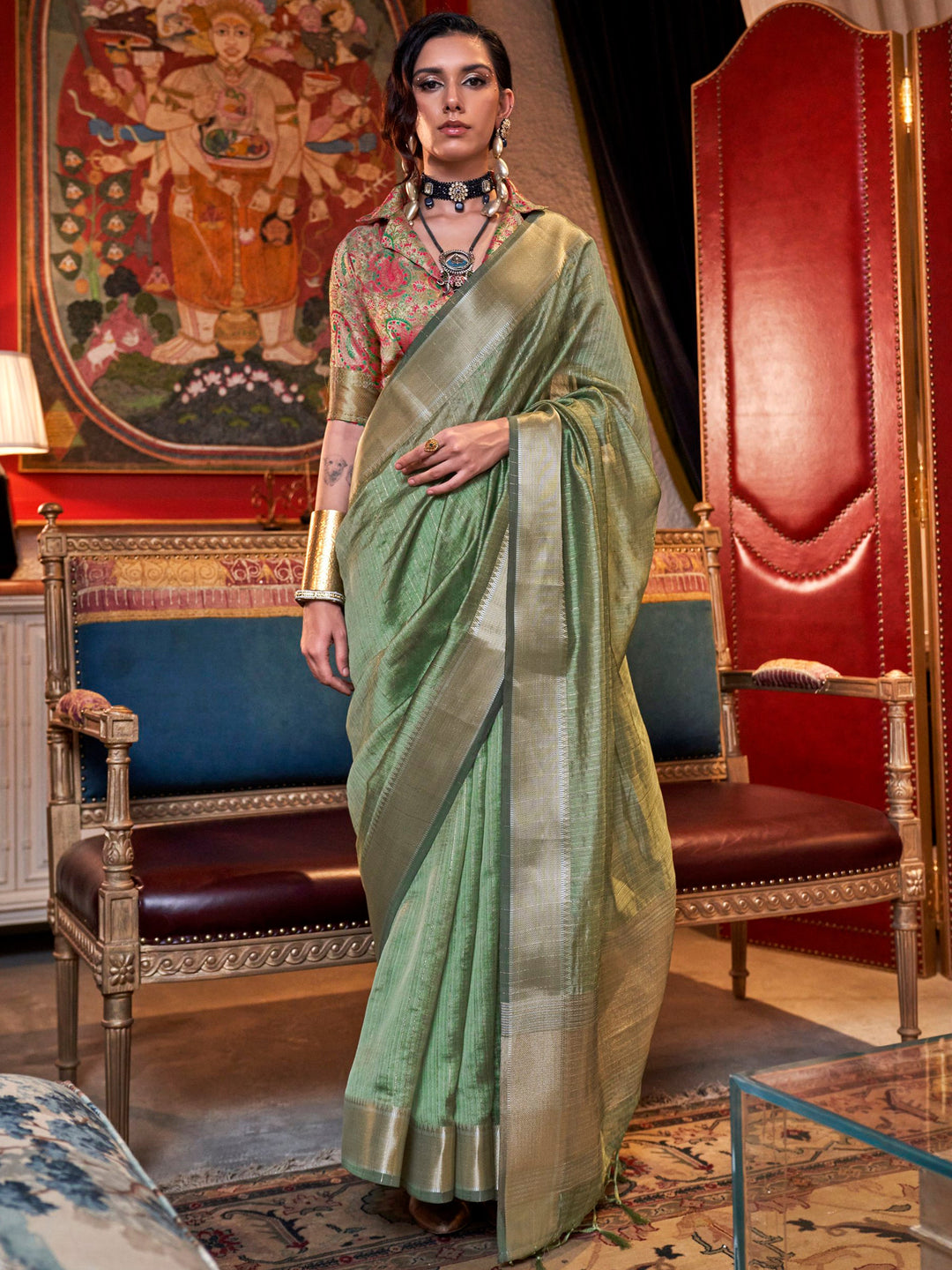 Green silk saree crafted for elegance and style.